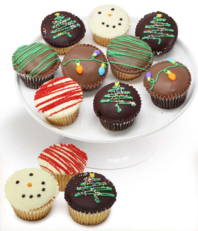 Hand Dipped in Belgian Milk, Dark, and White Chocolate, decorated with Holiday Themed Drizzles, Christmas Trees, Christmas Lights, and Snowman Faces. Cake Flavors include Vanilla and Chocolate, infused with Buttercream. Includes Gift Box.
