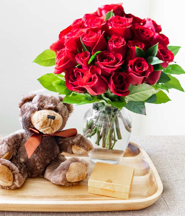 Two Dozen Red Roses with Chocolates &amp; Teddy Bear in a Clear Glass Vase 