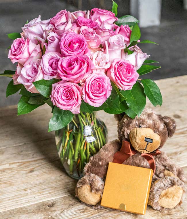 Two Dozen Pink Roses with a Clear Glass Vase, Chocolates, &amp; Teddy Bear