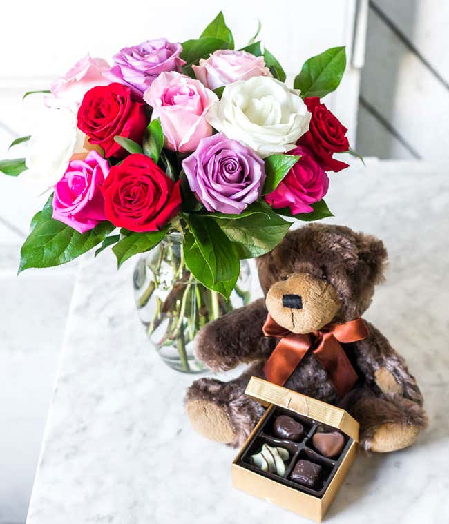 One Dozen Red, Pink, Purple &amp; White Roses with a Clear Glass Vase, Chocolates, &amp; Teddy Bear