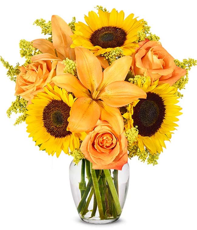 A vibrant floral arrangement featuring sunflowers, orange lilies, yellow solidago, and orange roses, complemented by a personal card message. Optionally presented in a vase.