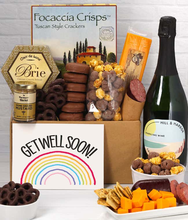 A gift set featuring a bottle of California Sparkling Wine, focaccia crisps, two cheeses, mustard, summer sausage, caramel popcorn, chocolate pretzels, six chocolate-covered Oreos and a Thank You card to complete the gourmet experience.